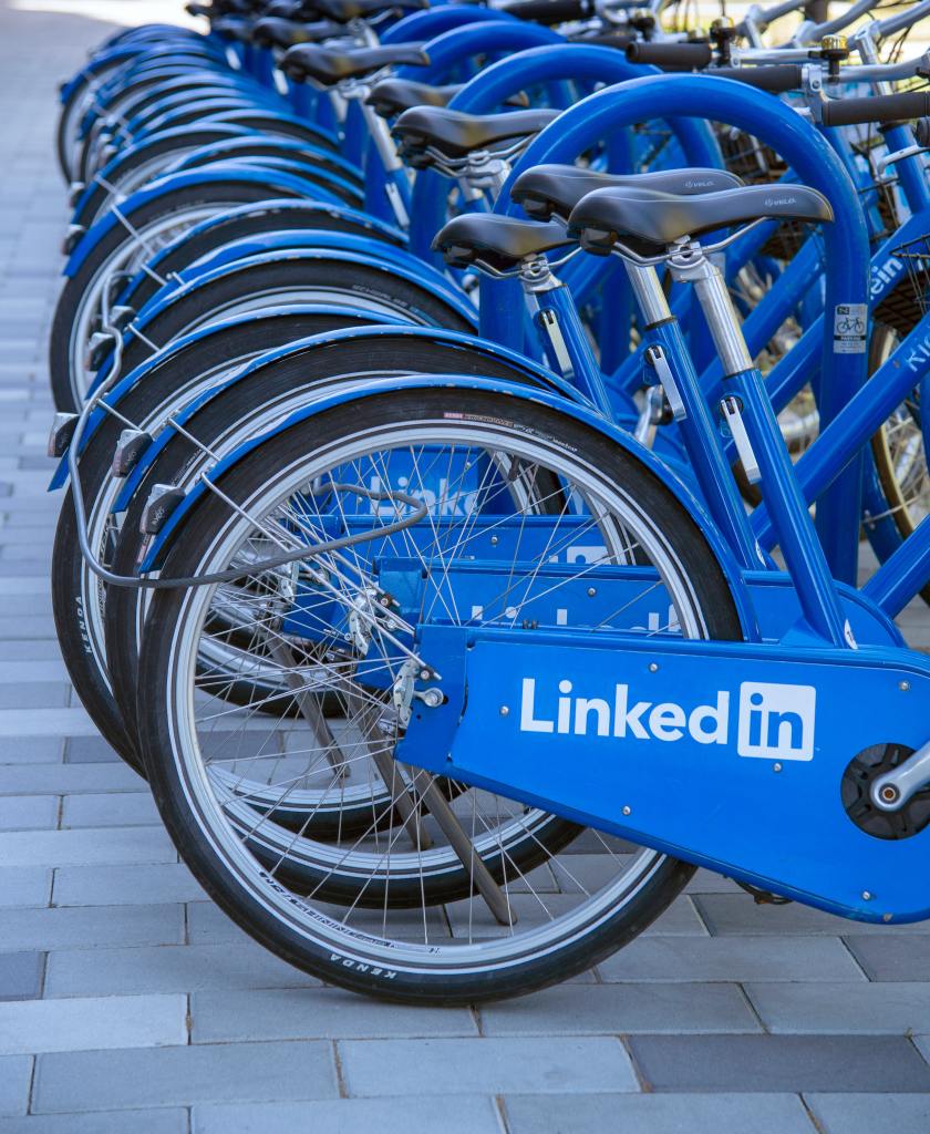 bikes in a rack with LinkedIn logo