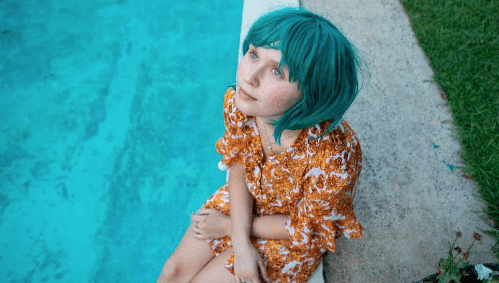 pensive girl by pool