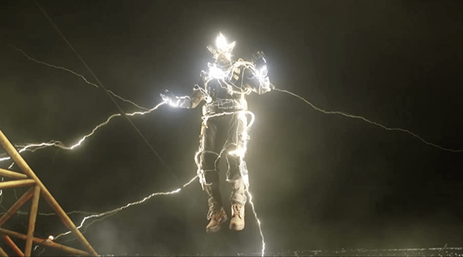 Electrical discharges off shining man in sky