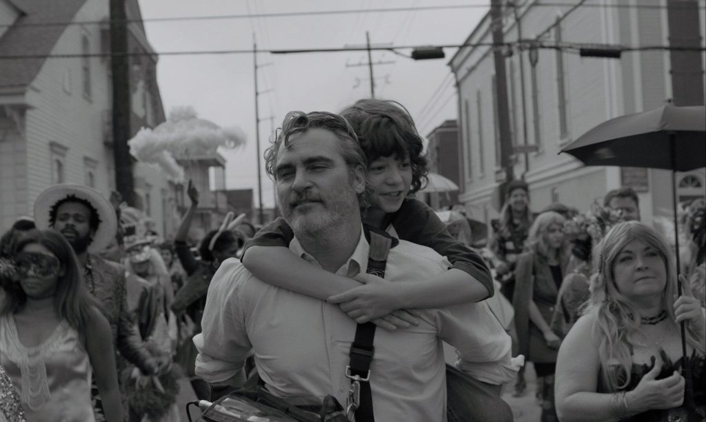 Joaquin Phoenix and actor Woody Norman in a still from C'mon C'mon.