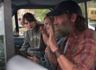 Family in car with intense signed conversation