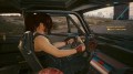 In Cyberpunk 2077, Claire’s car interior displays the trans pride flag, signalling to the player that her identity is not a secret, nor a source of shame. Image: Michelle Cormier/Monash University, CC BY-SA.