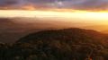 The Mosquito Bowl is now filming in QLD. Sunset view over the Gold Coast rainforest hinterland from O'Reilly's, courtesy of Destination Gold Coast.