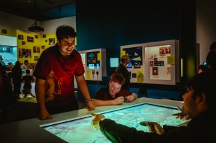 Teens play Dungeons and Dragons interactive. Image: Matto Lucas/ACMI Game Worlds.