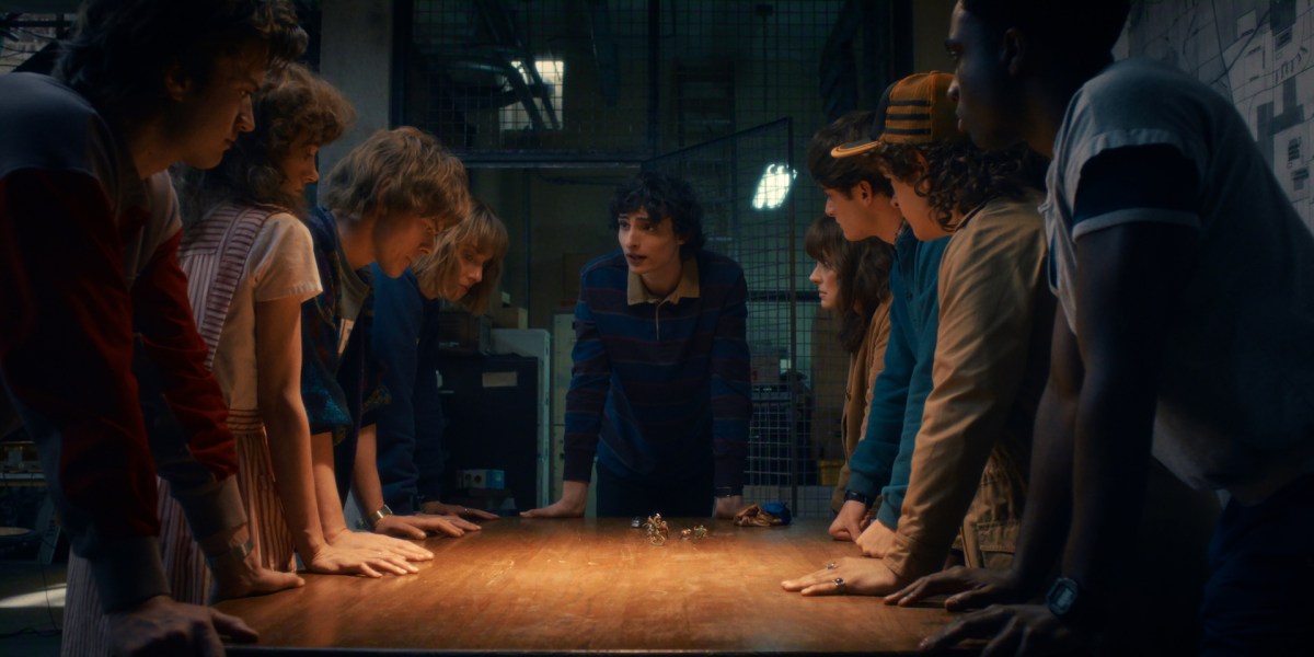 Stranger Things: Season 5. (L To R) Joe Keery As Steve Harrington, Natalia Dyer As Nancy Wheeler, Charlie Heaton As Jonathan Byers, Maya Hawke As Robin Buckley, Finn Wolfhard As Mike Wheeler, Winona Ryder As Joyce Byers, Noah Schnapp As Will Byers, Gaten Matarazzo As Dustin Henderson, And Caleb Mclaughlin As Lucas Sinclair In Stranger Things: Season 5. Image: Netflix © 2025.