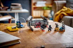 Lego's new Smart Brick is Smart Brick filled with sensors and a synthesiser, and ties in with the Star Wars IP. The photo shows recognisable objects and characters from Star Wars including a TIE Fighter and Darth Vader. lego star wars