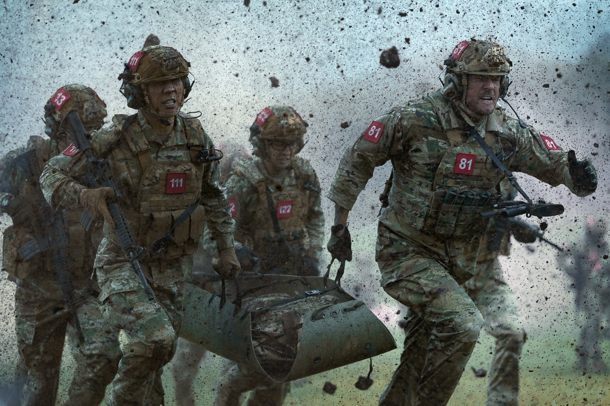 Richard Cotta, Yuchen Wang, Heather Burridge And Alan Ritchson In War Machine. Image: Ben King / Netflix.