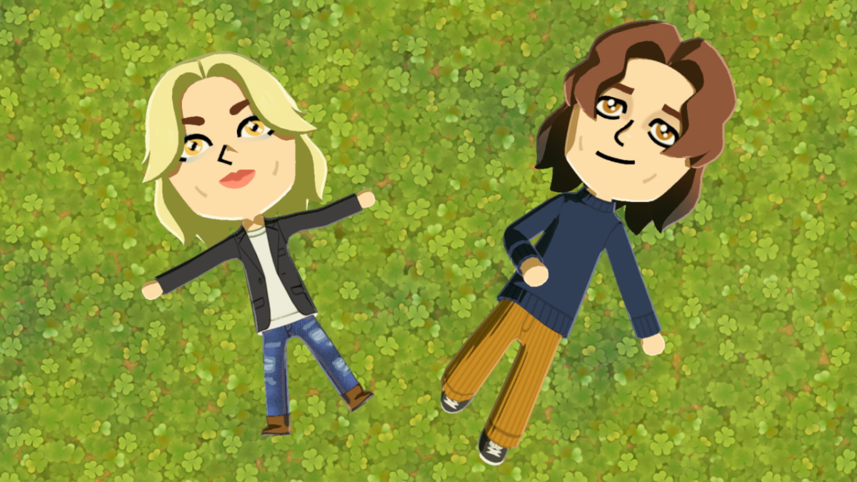Tomodachi Life: Living the Dream - two Miis lying on the grass looking up wistfully at the sky