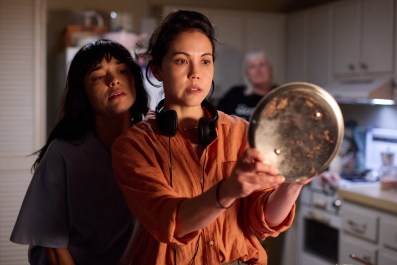 Natalie Erika James (centre) on set with Midori Francis during the filming of Saccharine. Photo: Supplied.